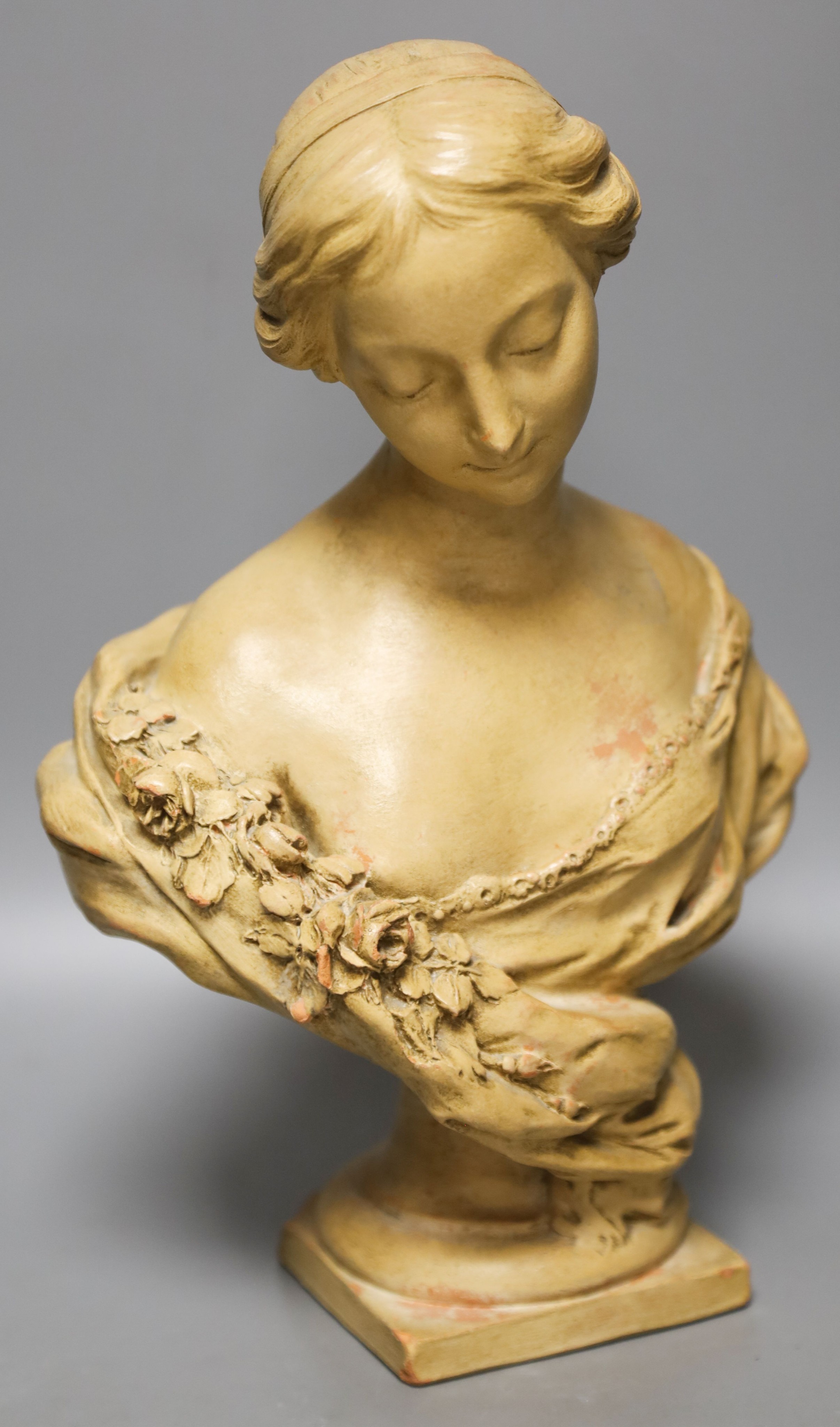 A cream painted terracotta bust of a lady 33cm